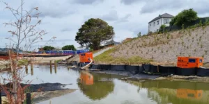 Dewatering and flood water management pumps hired from NES Hire in action removing flood waters.