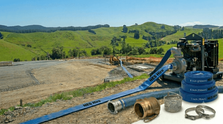 Layflat hose from NES Hire set up at a rural construction site.