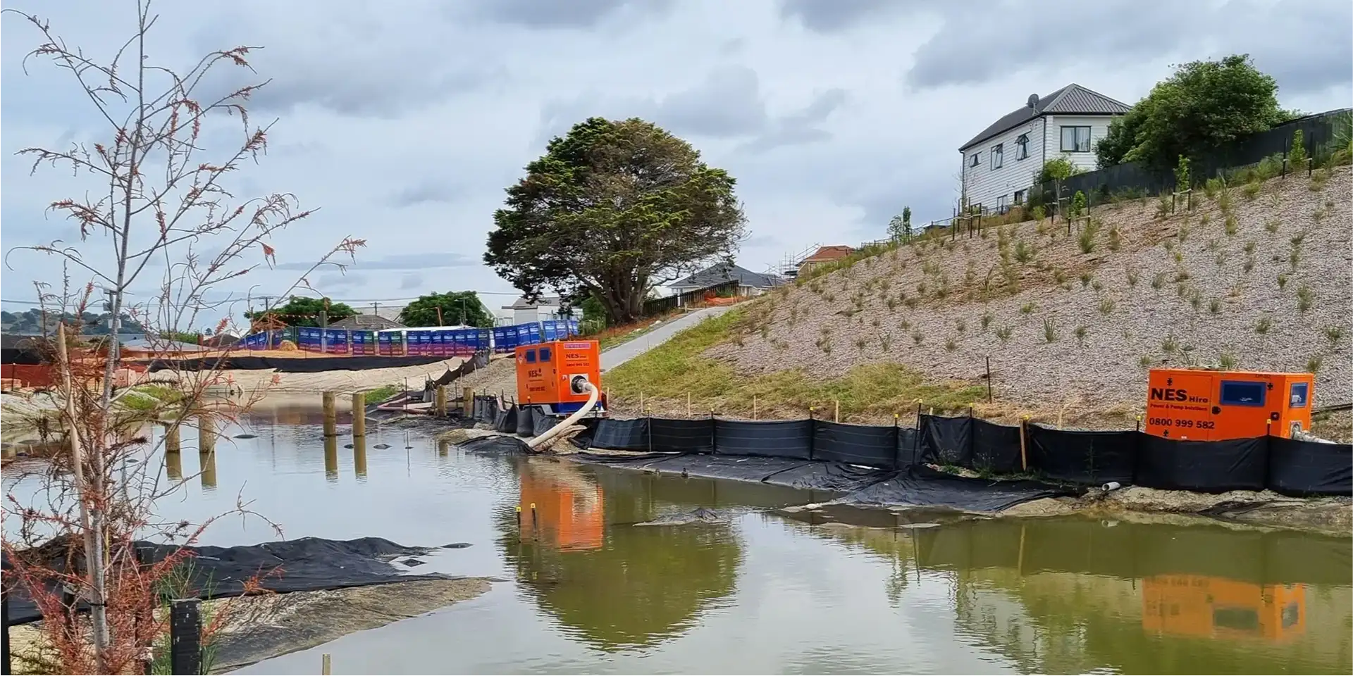 Dewatering and flood water management pumps hired from NES Hire in action removing flood waters.